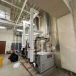 Commercial boiler and mechanical room serviced by Young's Mechanical Solutions — mechanical room, boiler