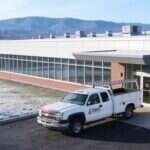 Young's Mechanical Solutions service truck parked at a medical office building on a frosty winter morning in the Shenandoah Valley